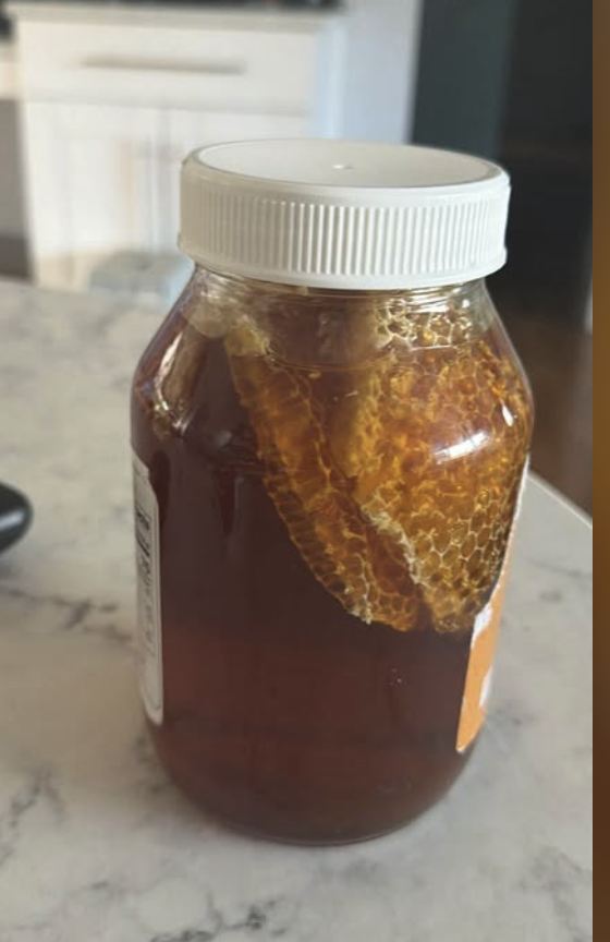 32oz jar of bottled honeycomb in raw honey